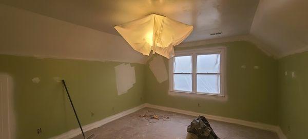 Fresh topcoat on ceilings after popcorn texture removal