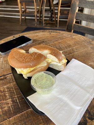 Egg and cheese bagel with cilantro aioli