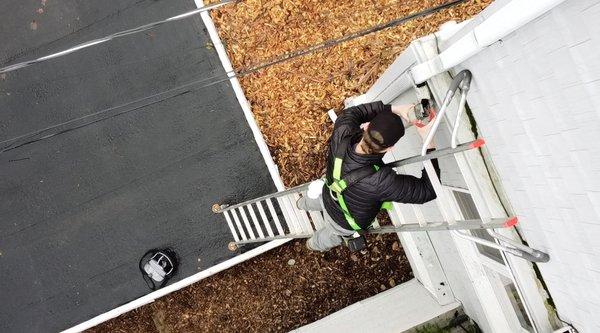 Installing new gutter system on a 2- story home