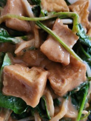 Spinach with peanut sauce and tofu.