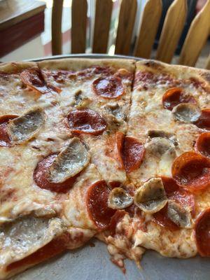 Large pepperoni and sausage pizza