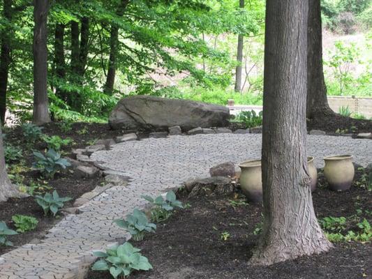 Hardscape the area for easy maintenance and enjoyment for years to come.