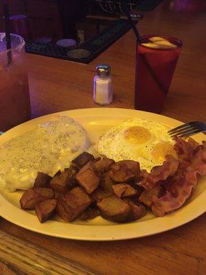 Biscuits and gravy with eggs cooked to your liking, potatoes and a side of bacon. Very reasonably priced. $5.99 + $1.50 for the bacon.