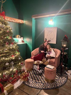 Family reading a book in this cozy nook while waiting for dinner to arrive at the table.