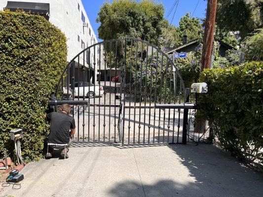 Double swing gate opener installation