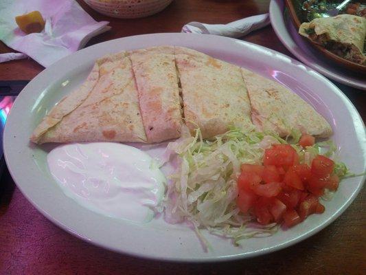 Shrimp quesadilla looks good but some of the shrimp had shells on um