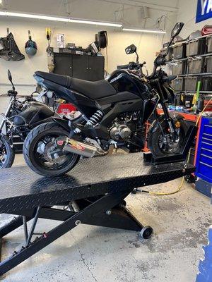 Z125 on the motorcycle lift