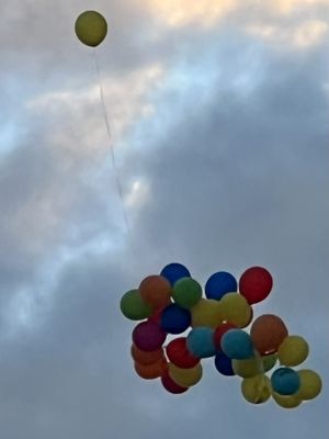 Balloon Release. People all dressed up for The Parking Lot Party The Parrot Heads before The Jimmy Buffett  Concert XFinity Center Aug 2022