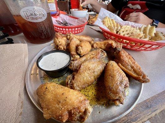 10 Wing Combo: 1/2 Lemon Pepper, 1/2 Ranch Dry Rub with Waffle Fries dusted in Ranch seasoning.