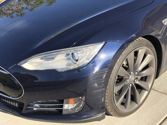 Before pic, deap scratches on tesla bumper