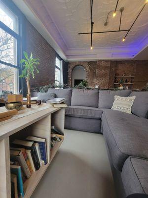 Different angles of the common relaxation seating area.  Love that exposed brick!