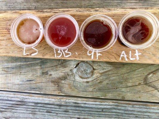 Beer flight with Saison, Blueberry, Amber, and Altbier