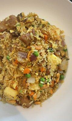 Tropical Fried Rice...curry fried rice with cashew, raisins, egg, onions, peas, shrimp and chicken.