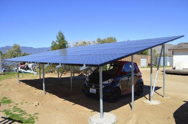 Ground mount array raised 5 feet to help provide shade out in Julian