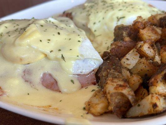 Classic eggs Benedict includes home fries