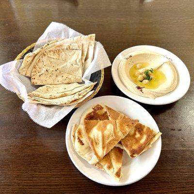 Hummus - Smoothly blended chickpea dip with tahini, garlic and lemon (small). 
 Grilled White Halloumi Cheese - Halloumi cheese grilled to p