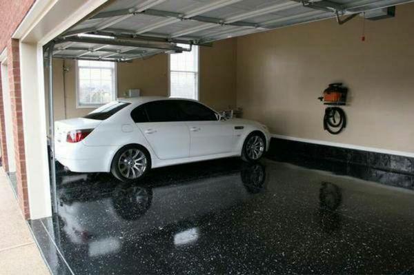 Epoxy garage flooring 
Black with metallic flake medley and gloss urethane finish