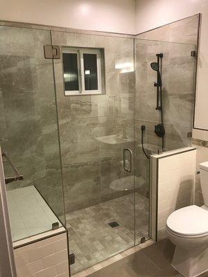 Frameless shower glass installed by Golden Glass