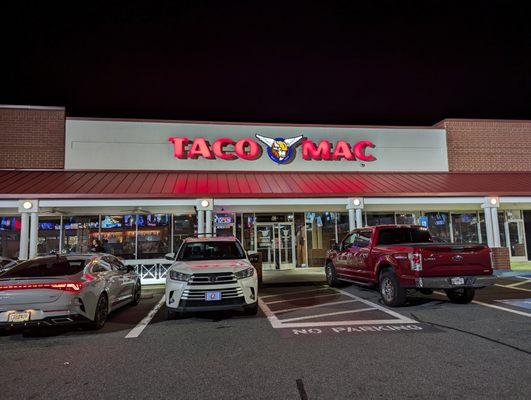 Outside. Storefront at night. Located in the Lowe's shopping center on Dallas Highway in West Cobb.