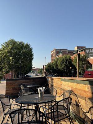 Outdoor seating with a view towards river market