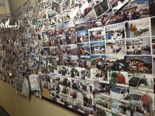 Wall of customer photos.