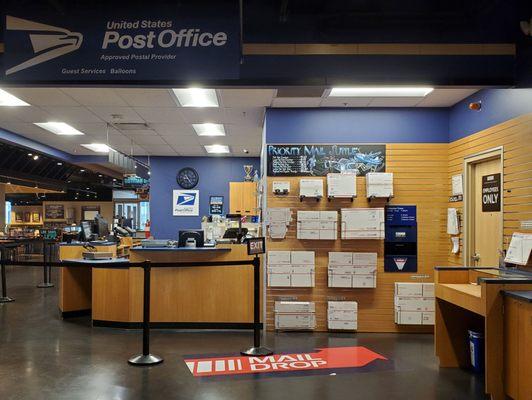 USPS on the 2nd floor. Getting stamps before the price goes up.