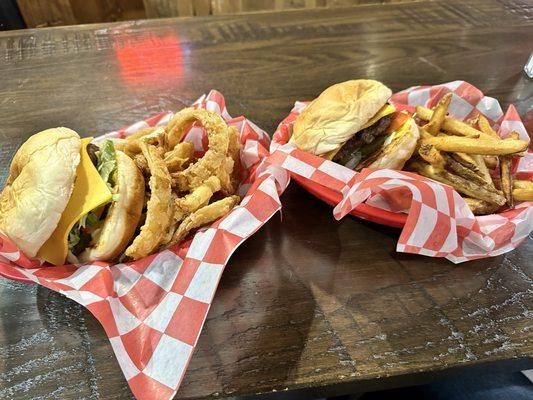 The Chevy burgers with cheese. A side of onion rings and fries.