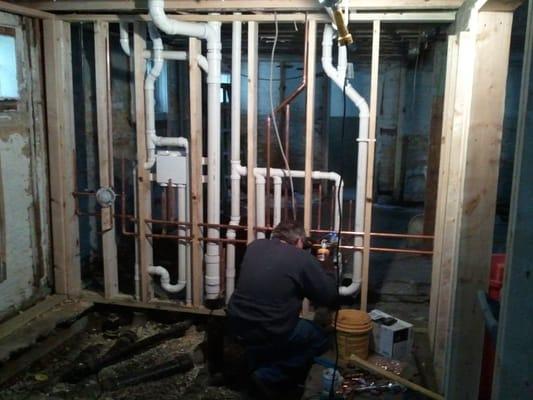 In the picture: John (Owner/Licensed Plumber)