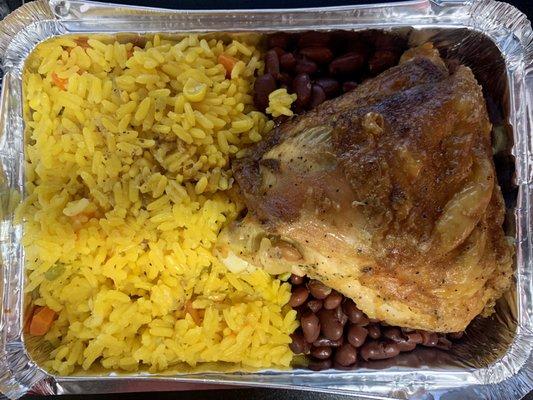 Baked chicken with yellow rice and beans