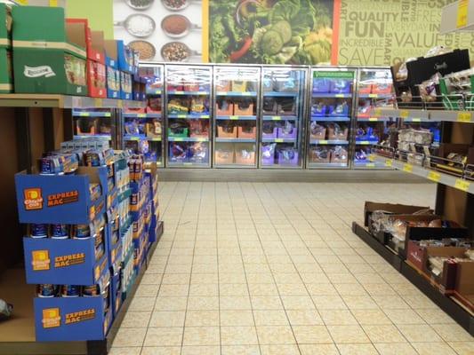 Opposite wall containing frozen foods - to the right is wee produce section