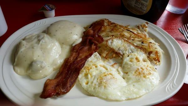 The Sunrise: two eggs, hashbrowns, bacon, and biscuits & gravy.