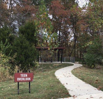 The Teen Overlook is a picnic/hangout area above a wooded valley.