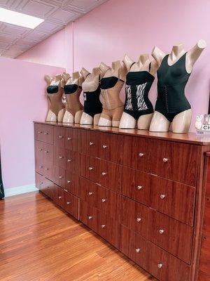 we have full body, strapless, corsets, vests, waist trainers, butt lifting panties, chin straps, bras, abdominal boards, foams, arnica!