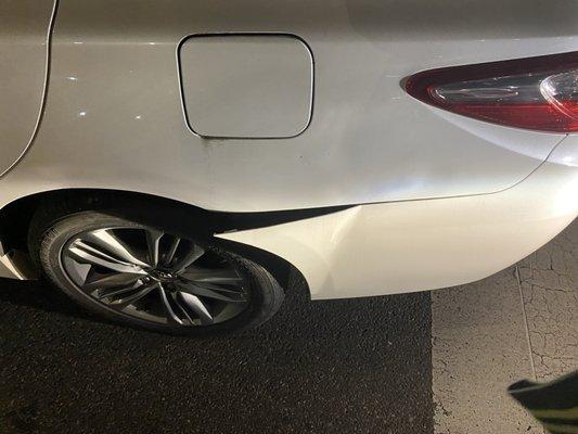 The damaged bumper.