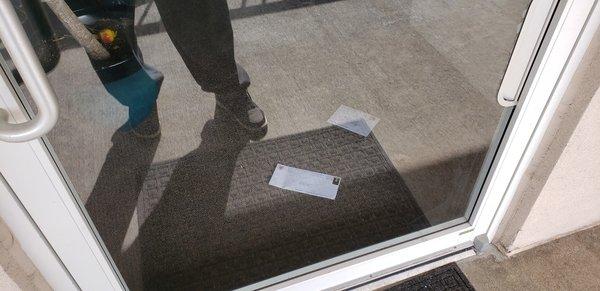 mail still on the floor at 11:07am