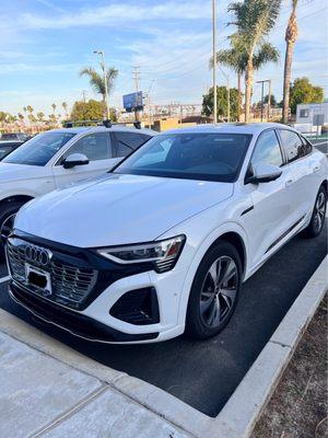 2024 Audi Q8 ETron Sportback - black optics on window trim and grill.