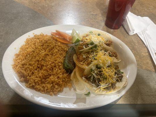 Taco plate no beans double rice. 2 chicken tacos and 1 carne asada