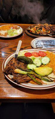 Carne asada and fajitas with chicken, shrimp, and steak.