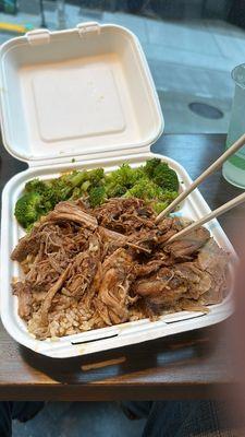 Pulled pork slathered on brown rice and a side of tender steamed broccoli, the staff are amazing and food is always good