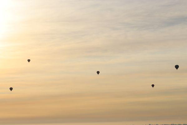 Hot Air Balloons floating toward Black Mountain, Rancho Penasquitos. (photo by Rebecca  Milkey)