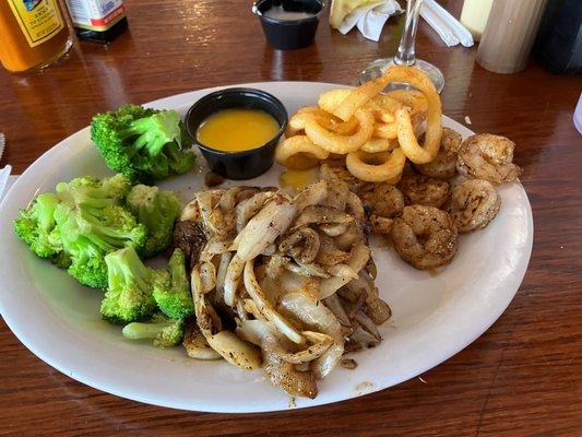 Surf and turf with broccoli and grilled onions. Ignore the curly fries I stole off my Dad's plate.