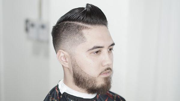 Skin fade combover and beard, done by Eric Gabrielson.