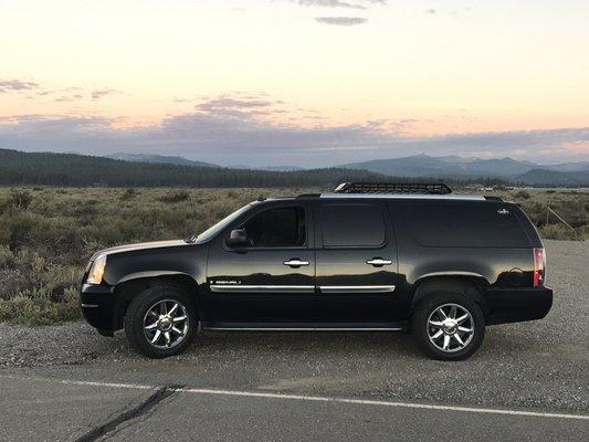 7 - passenger black SUV-GMC Yukon Denali XL w a roof rack!!!