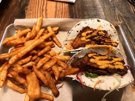 Korean pork tacos with fries.  The meat was super tender.