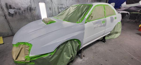 Subaru STI in the paint booth