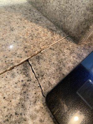 Cracked granite near cooktop