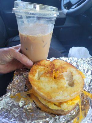 Double cheese sausage egg bagel sandwich and iced white mocha triple shot!