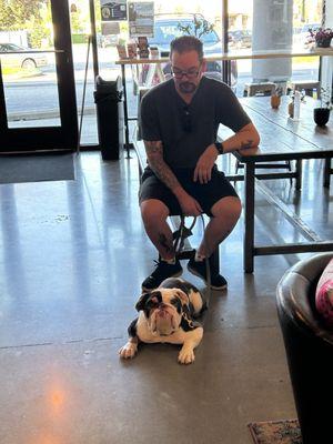 Jax, demonstrating his excellent manners, siting, quietly, and patiently waiting while my wife get's a food order.