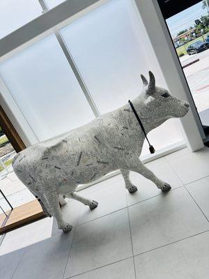 Bull with bell in lobby