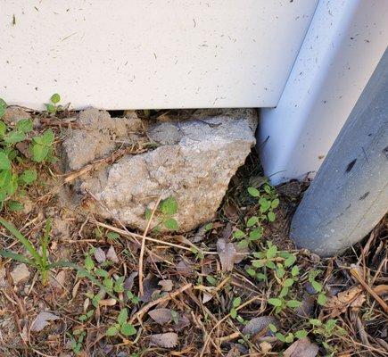 Did not remove concrete from previous fence, simply put new fence over it.